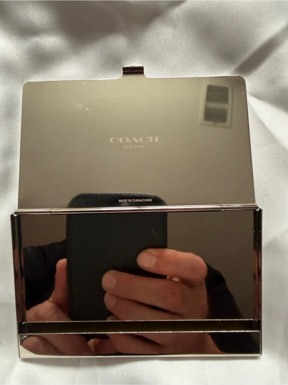 Coach compact metal